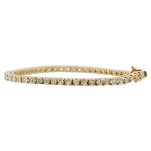 Italian 14k Gold and 2.6ct Diamond Tennis Bracelet: DESCRIPTION: An Italian 14k yellow gold Diamond Tennis Bracelet features 0.05ct diamonds amounting to approx. 2.6cts Total. Stamped "Italy" and "14k". Total Weight: 7.8 dwt CIRCA: 20th Cent. ORIGIN: I