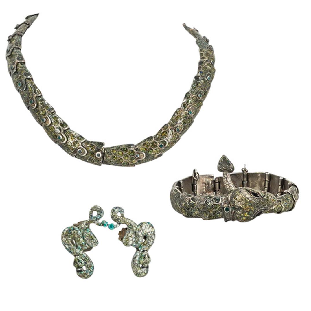 Margot De Taxco Sterling Enamel Serpent Jewelry Suite: DESCRIPTION: Margot de Taxco (Margot van Voorhies Carr) Sterling silver polychrome enameled jewelry suite, composed of a reticulating snake necklace and snake bracelet with matching clip back earrings