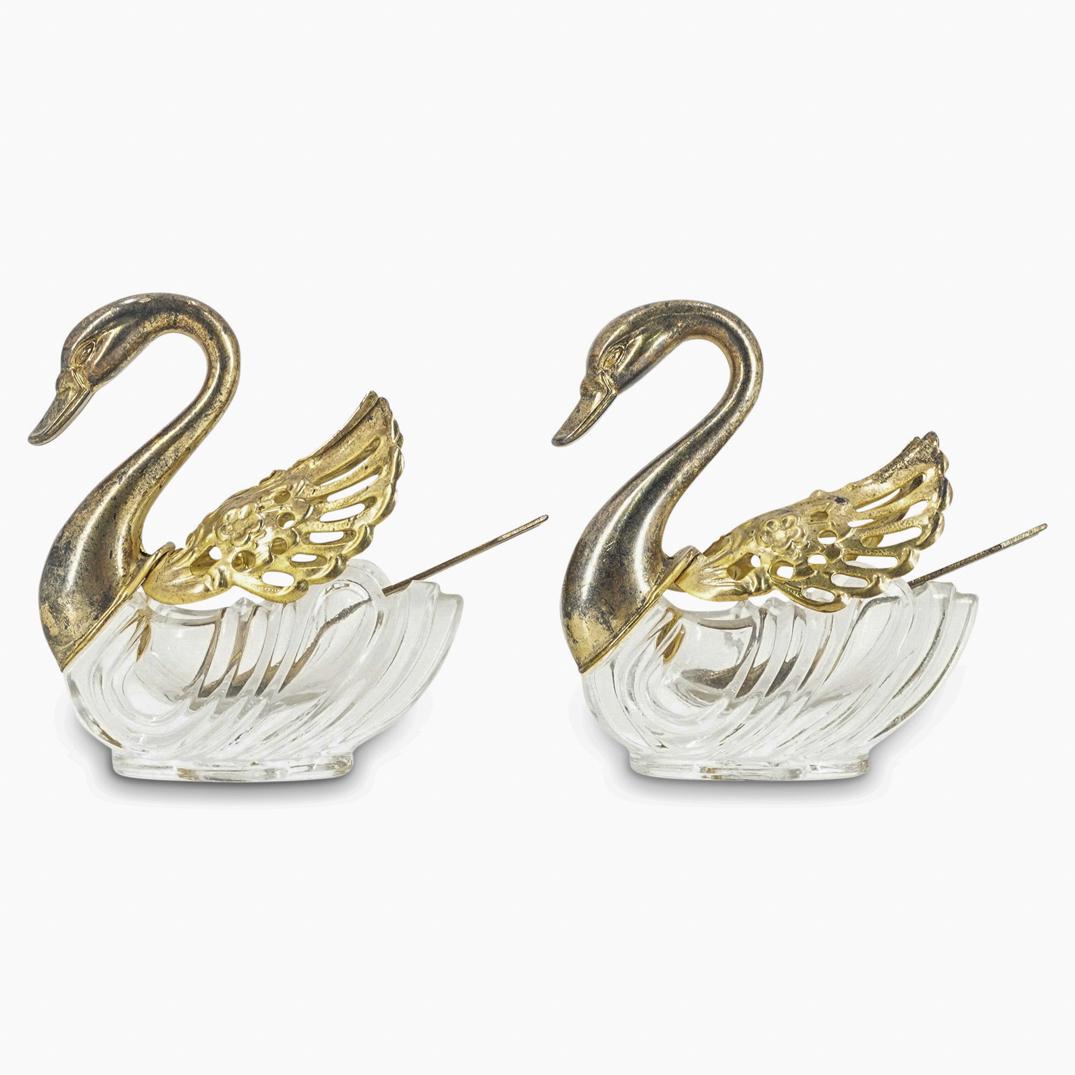 Pair of Italian Metal & Glass Swan Salt Cellars: DESCRIPTION: Pair of Italian gilt metal and glass swan salt cellars. Marked: "Italy" CIRCA: 20th Cent. ORIGIN: Italy DIMENSIONS: H: 3.5" x W: 1.5" x L: 3" (Spoon) H: 3" CONDITION: Great condition. See
