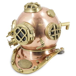 Replica Deep Sea Scuba Diving Helmet: DESCRIPTION: A reproduction deep sea scuba diving helmet composed of brass and copper. Attached plaque: "U.S. Navy Diving Helmet, Mark V, Morse Diving Equipment Co. Inc. Boston Mass." CIRCA: 20th Cent