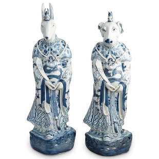 (2 Pc) Chinese Blue & White Zodiac Porcelain Sculptures: DESCRIPTION: Pair of large glazed blue and white porcelain statues-one depicting an anthropomorphic dog, one an anthropomorphic rabbit-as represented in the Chinese zodiac. Each piece has GuangXu era