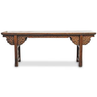 Antique Chinese Wood Altar Table: DESCRIPTION: An antique Chinese wood alter table with brown wood foundation heavy carved vine relief decorated skirting, finished on four squared legs with open-work foliate carved stretchers. CIRCA: