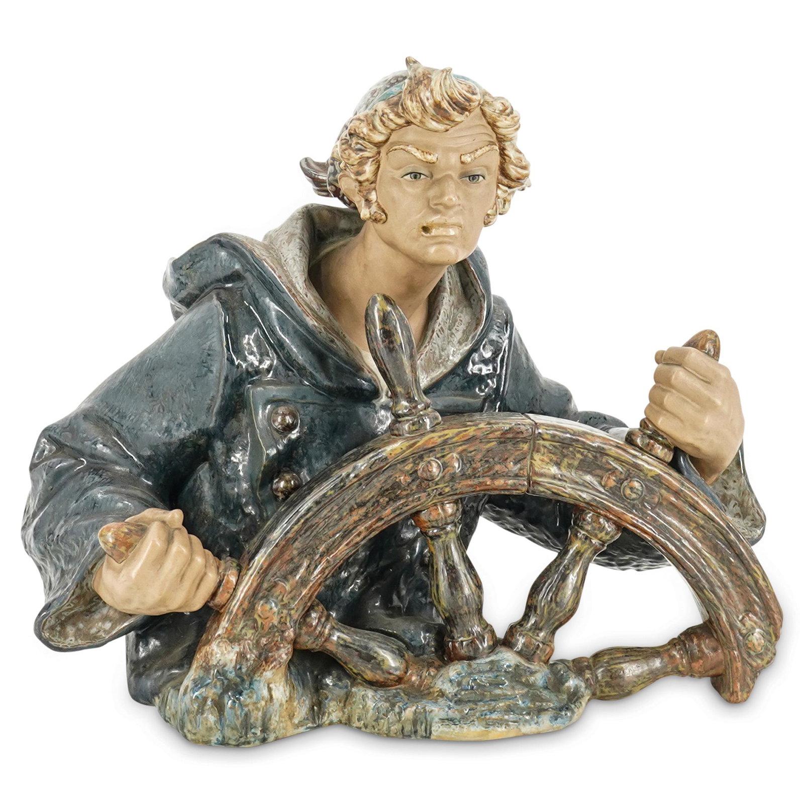 Lladro Seaman Helmsman Porcelain Figurine: DESCRIPTION: A Lladro Seaman Helmsman porcelain figurine. Model number #1325. Depicts a Sailor / Sea Captain bust behind a ship steering wheel. With the Lladro hallmark on the underside. CIRCA: 20th C