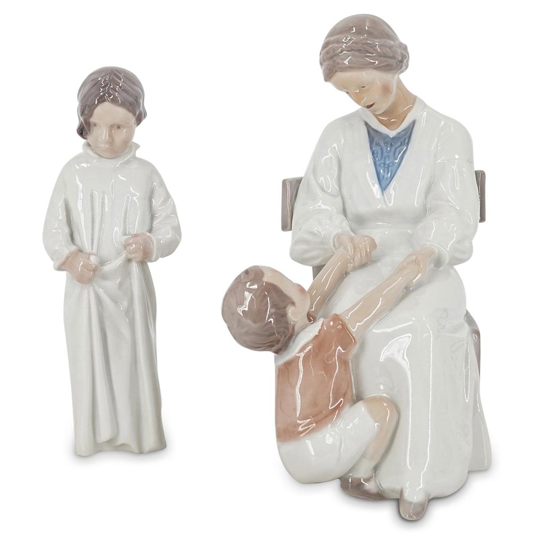 (2 Pc) B&G Bing & Grondahl Glazed Porcelain Figurines: DESCRIPTION: (2 Pc) A Pair of B&G Bing & Grondahl glazed porcelain figurines. This set includes: one (1) porcelain figurine depicting a standing girl dressed with a long white nightgown. Model #1624; 