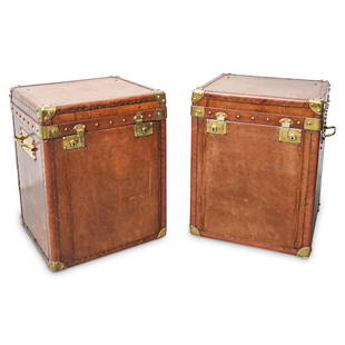 Pair of Antique English Leather Travel Trunks: DESCRIPTION: A pair of antique English leather travel trunks with squared form, brass mounted hardware, and double keyhole entree locking latches. Opens at hinge to reveal black striped silk lined