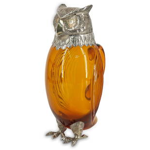 Cartier Sterling Silver & Amber Crystal Owl Claret Jug: DESCRIPTION: A Cartier sterling silver & amber crystal figural owl shaped claret jug. Features intricate textured feather and eye details. Stamped along underside of feet with "Sterling" and "Cartier"