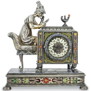 Antique Viennese Silver Enamel & Jewel Encrusted Figural Clock: DESCRIPTION: Antique Viennese silver enamel clock with sitting figure reading a novel form. Features ornate foliate engraved details with polychrome enamel and semi precious stone insets. Clock featur