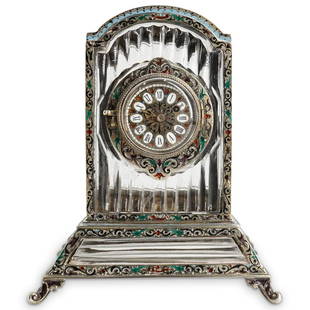 Austrian Enameled Silver & Rock Crystal Desk Clock: DESCRIPTION: 19th Cent. Austrian enameled silver and rock crystal clock. Features a coffin formed foundation with foliate engraved trims, clock designed with Roman Numeral numbering and vine engraved