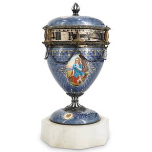 Austrian Guilloche Enamel Annular Clock: DESCRIPTION: Antique Austrian guilloche enamel annular clock with egg form. Features finely enameled cartouches of young beauties on a blue guilloche enamel, the two sections divided by two silvered