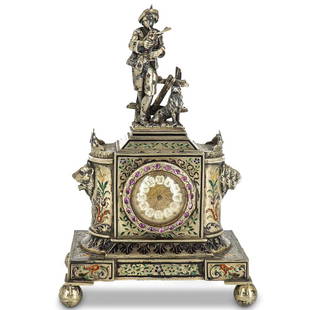 Antique Viennese Silver Enamel & Jewel Encrusted Figural Clock: DESCRIPTION: Antique Viennese silver enamel clock. Features a center Roman Numeral numbered dial with vine engraved decoration, and hinged crystal inset case door. Designed with jewel encrusted figura