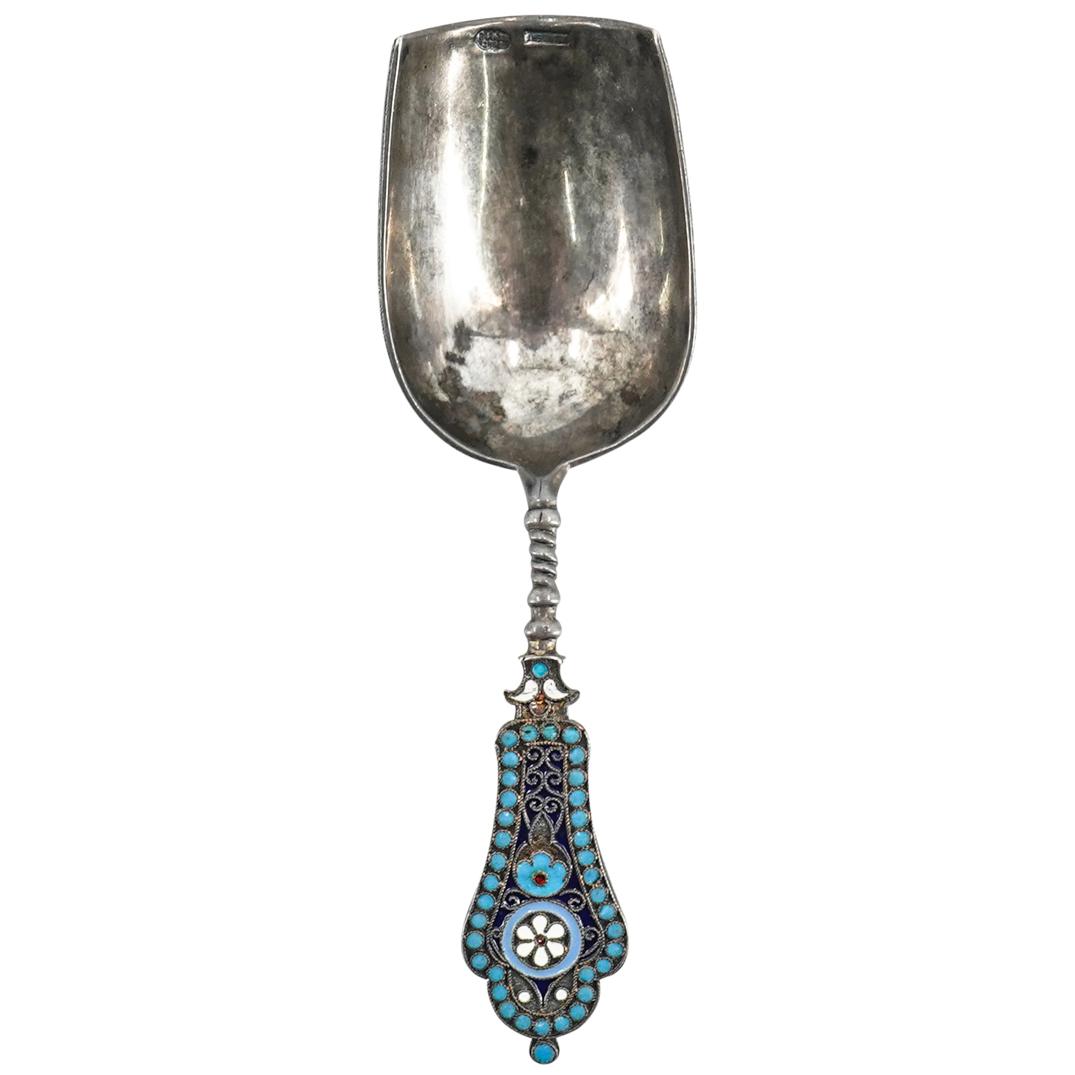 Russian Silver Gustav Klingert Scoop Spoon: DESCRIPTION: A Russian silver Gustav Klingert scoop spoon. Features elegant champleve enameled scrolled floral motif in an array of blue hues. Finished with a spiraled handle, and vermeil gilded inter