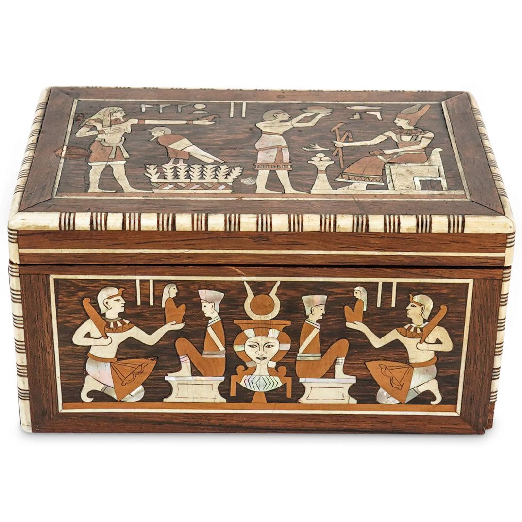 Egyptian Revival Bone & Abalone Inlaid Box: DESCRIPTION: An antique Egyptian revival bone and abalone shell inlaid box, featuring and overall wood foundation carved bone trims and inlaid figural Egyptian scenes. CIRCA: Early 20th Cent. ORIGIN: