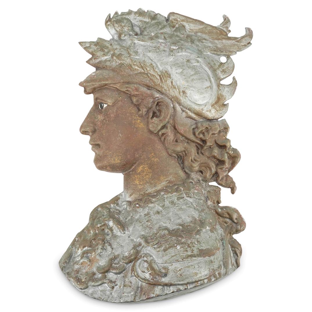 Neoclassical Wall Aluminum Ornament: DESCRIPTION: A Neo-Classical aluminum wall ornament of an ancient soldier wearing a helmet with painted enamel eyes. CIRCA: Early-Mid 20th Cent. ORIGIN: USA DIMENSIONS: (H: 15.5" X W: 11") CONDITION: 