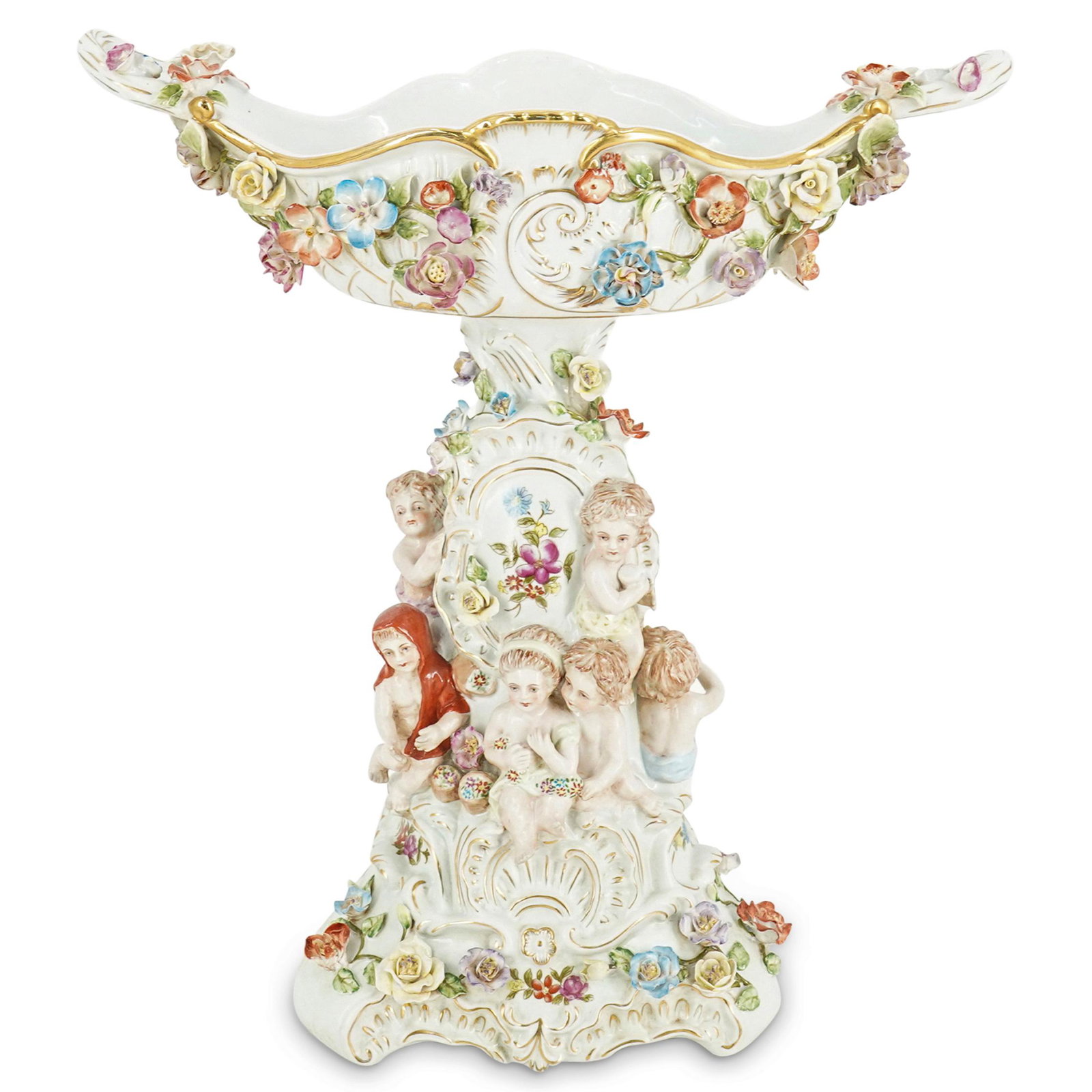 Meissen Style Porcelain Centerpiece: DESCRIPTION: Meissen-style porcelain centerpiece featuring several puttos playing around the base, copious floral designs, and crowned with a handled bowl. Embellished with floral motifs within the bo