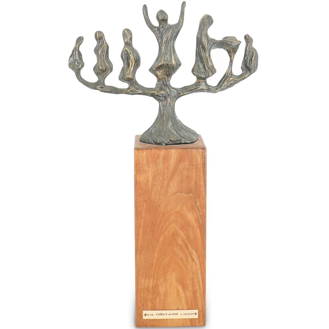 Limited Edition Judaica K. Treister "The Family of God" Bronze Sculpture: DESCRIPTION: A Judaica Kenneth Treister "The Family of God" bronze sculpture. This is a limited edition bronze menorah depicting a figural family, atop a wooden base. It was commissioned by the United