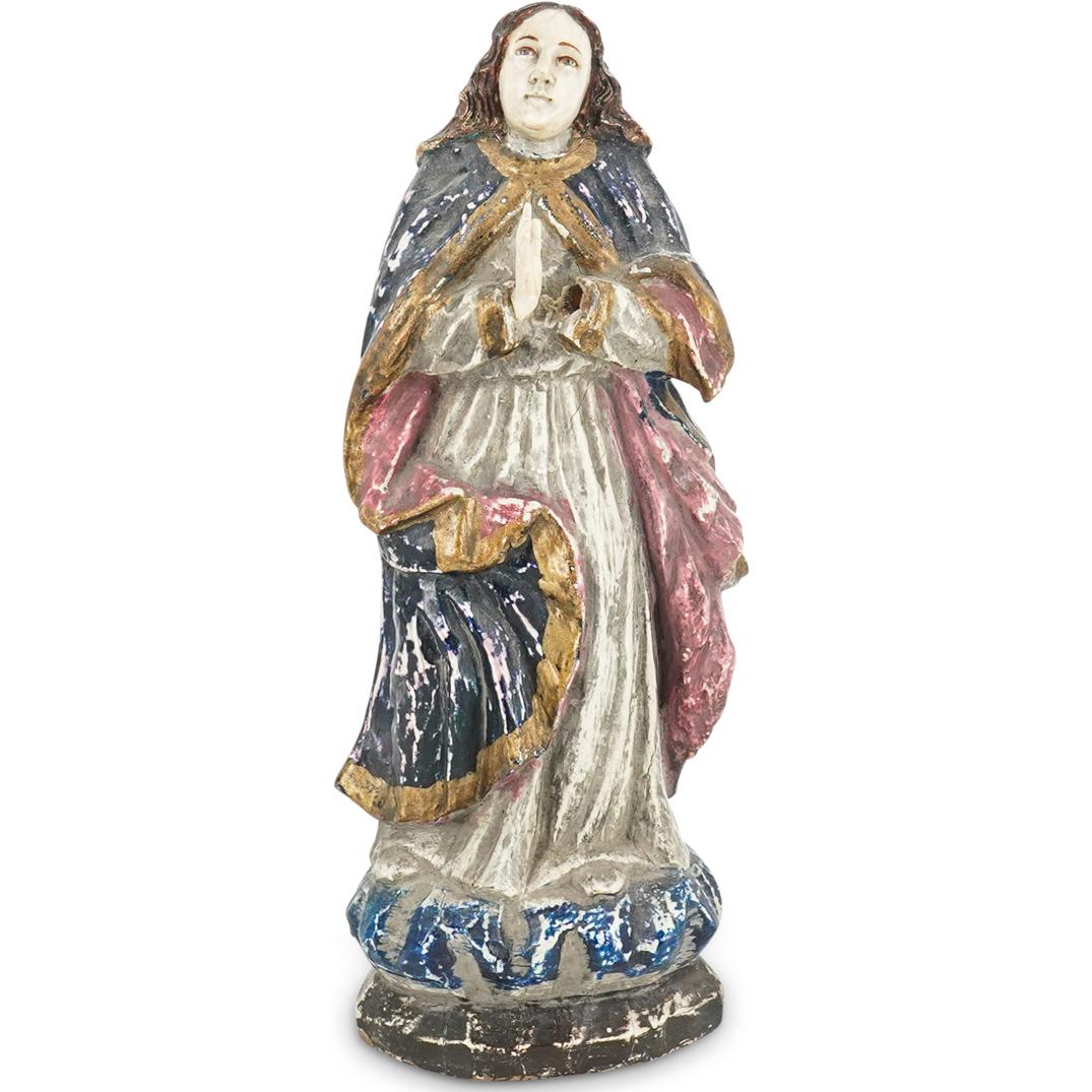 Antique Spanish Colonial Carved Wood Religious Figure: DESCRIPTION: An antique Spanish Colonial carved wood religious female figure in a standing praying position, holding hands in prayer and gazing upwards. The polychrome hand-carved wood body is painted
