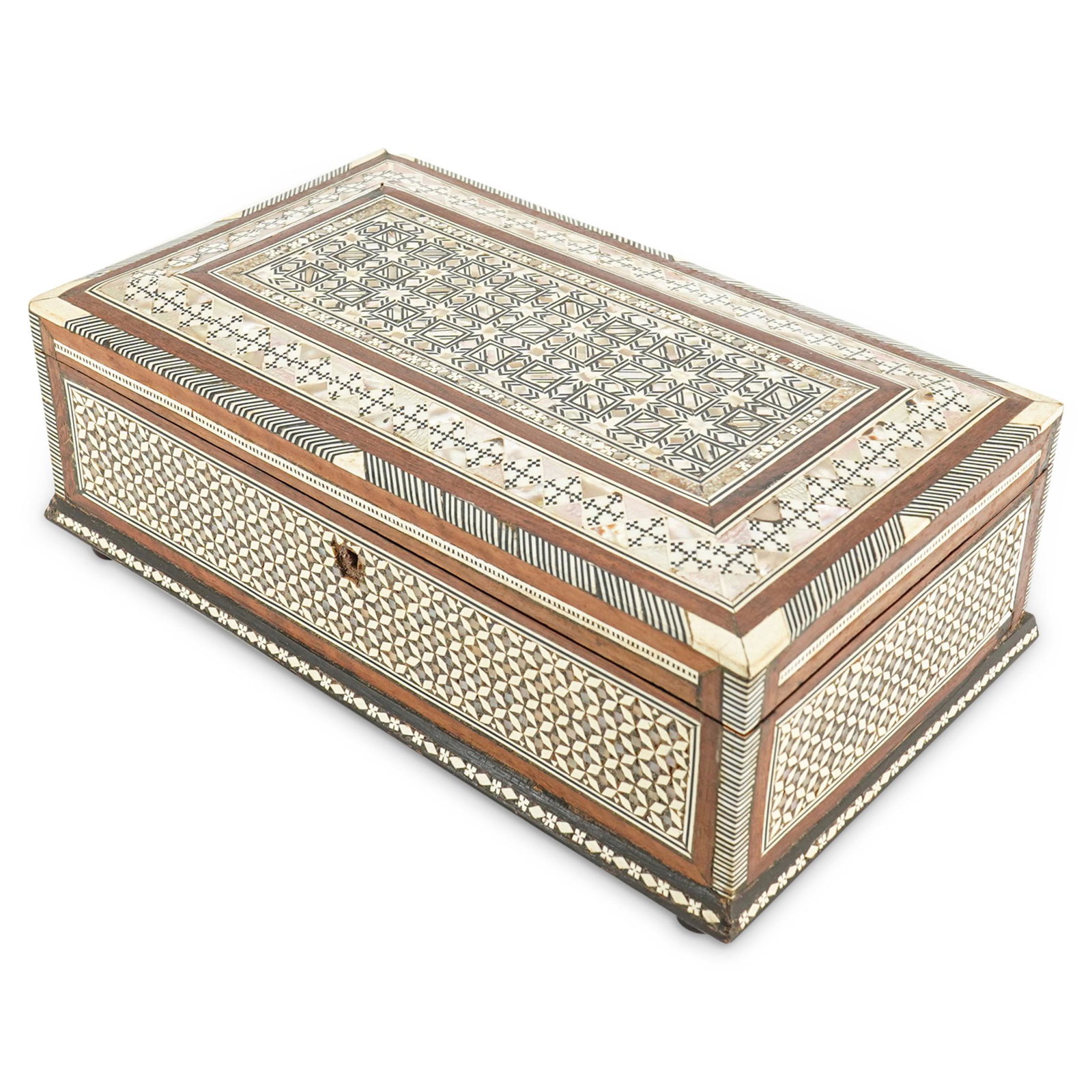 Antique Syrian Mother of Pearl & Bone Cigarette Box: DESCRIPTION: A Syrian wood cigarette box with ornately decorated khatam bone & mother of pearl at the exterior. CIRCA: Early 20th Century ORIGIN: Syria DIMENSIONS: H: 4" X W: 6.5" X L: 10.75" CONDITIO