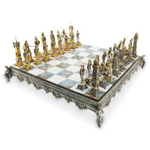 Giuseppe Vasari For Gorham Bronze and Marble Crusader Chess Set: DESCRIPTION: Giuseppe Vasari (Italian, 1934-2005) For Gorham Crusader chess set, featuring a two-toned marble chess board with silvered metal foundation, finished with figural mounted supporting