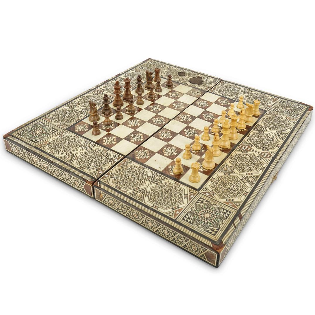 Antique Persian Parquetry Chess And Backgammon Set: DESCRIPTION: Chess and Backgammon set including a case with intricate marquetry work throughout, a nearly complete set of Chess pieces, and a nearly complete Backgammon set. Case and backgammon pawns