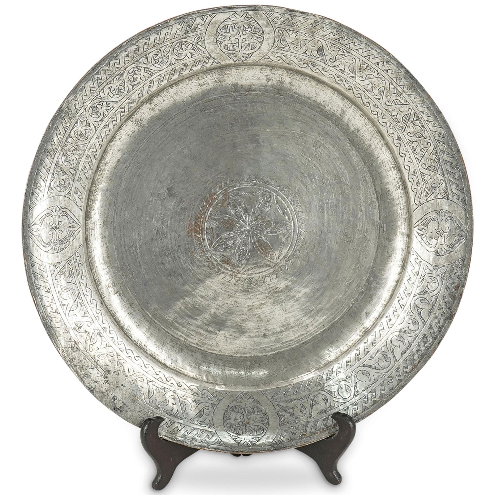Antique Ornate Islamic Charger Silver Plated: DESCRIPTION: Antique silver plated Islamic charger etched with traditional ornate patterns around edge and in the center. CIRCA: 20th Century possibly older ORIGIN: Middle East DIMENSIONS: H: 1.62" X