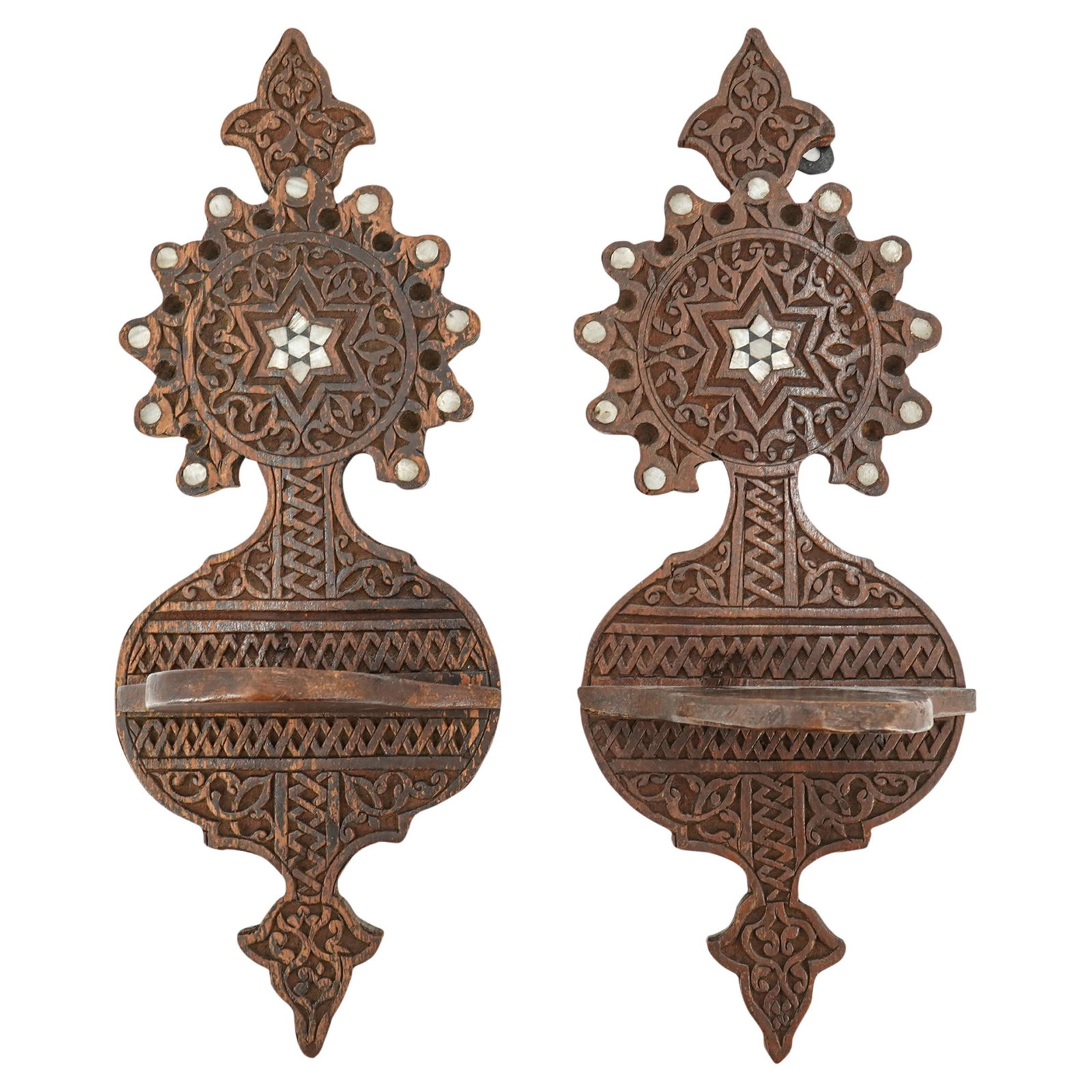 (2Pc) Pair of Syrian Mother of Pearl Inlaid Wood Shelves: DESCRIPTION: Pair of Syrian wood shelves with hand carve floral decorations throughout and star mother of pearl inlay in center of circular ring of inlays. CIRCA: 20th Century ORIGIN: Syria DIMENSIONS