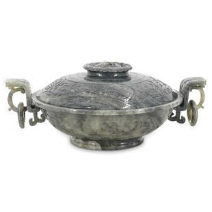 Antique Chinese Carved Black and White Jade Censer: DESCRIPTION: A Antique Chinese carved lidded bowl featuring in Black, white and light green hues decorated along the lid and lower bowl with raised intertwining vine motifs, centered by a blossoming