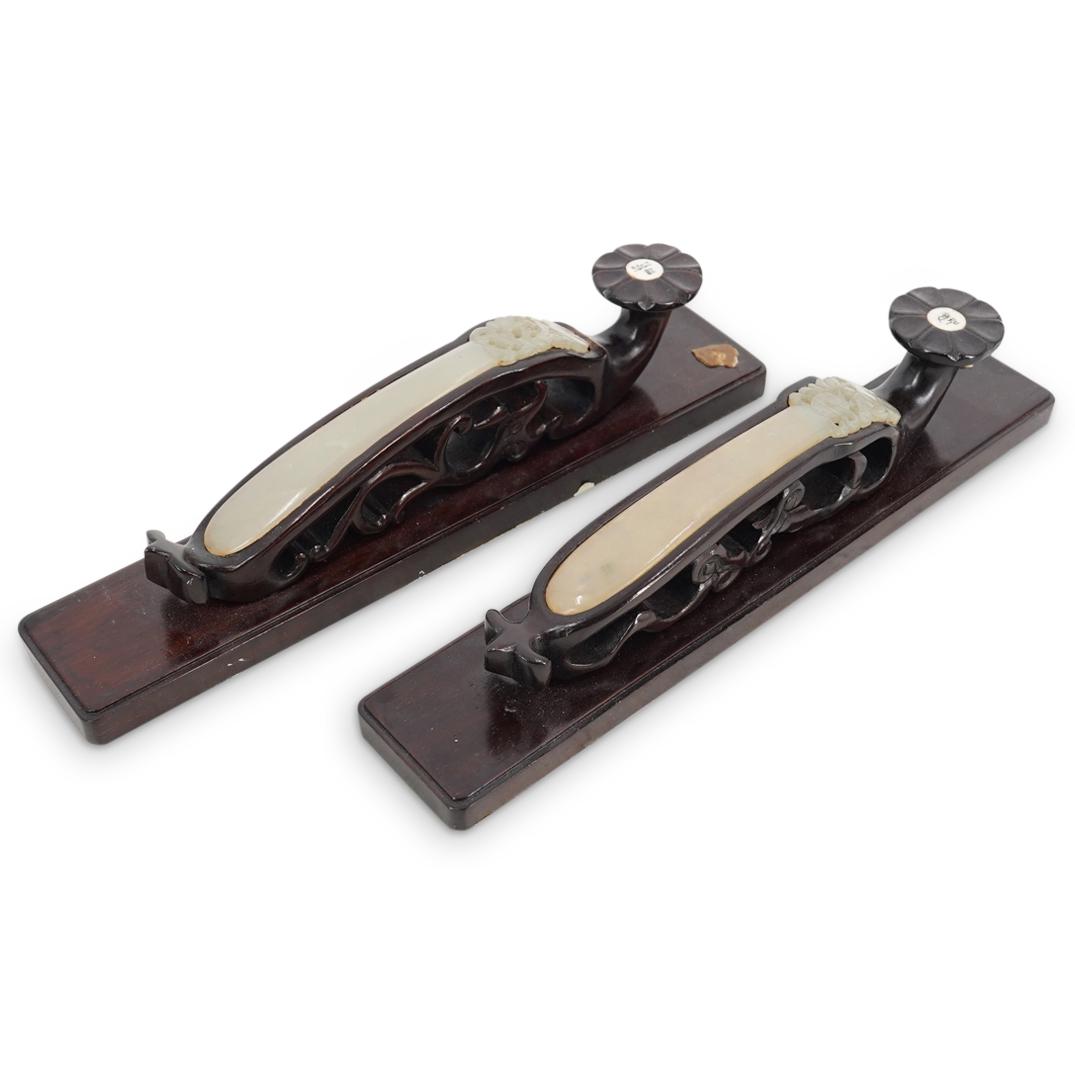 Pair Antique Chinese Jade Hair Pin Scroll Weights: DESCRIPTION: A pair of antique jade Hair pins mounted in wood carved stands - utilized as scroll weights. Stands inlaid with character marked bone plaques. Partial red wax seal at stand. Converted int