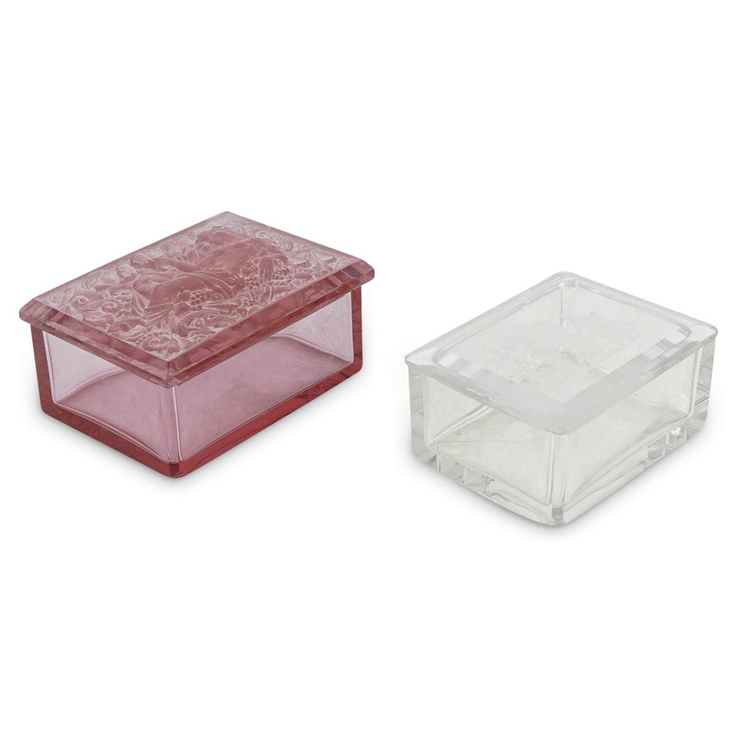 (2 Pc) 1930s Czech Curt Schlevogt Crystal Dresser Vanity Boxes: DESCRIPTION: (2 Pc) A Pair of 1930s Curt Schlevogt crystal dresser vanity boxes. This set includes: one (1) clear crystal lidded box designed with a rectangular shape and featuring a detailed etched f