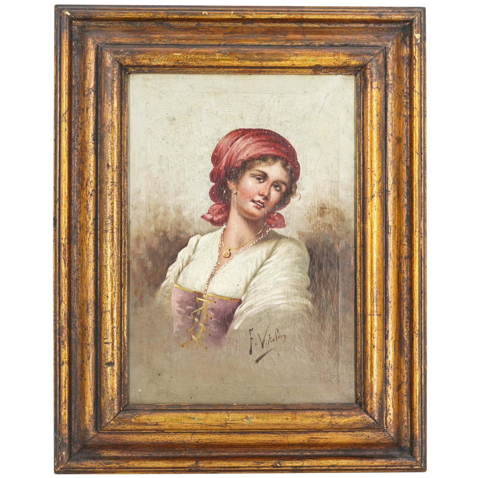 Antique Italian Oil On Canvas Painting: DESCRIPTION: An antique Italian oil on canvas painting featuring a portrait of Italian women wearing gold locket and reddish hairpiece. Signed lower right: F. Vitape" mounted in a gilt wood frame. CIR