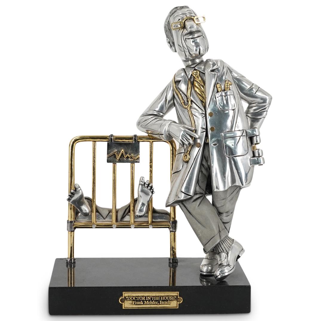 Frank Meisler (1925-2018) "Doctor In The House" Metal Sculpture: DESCRIPTION: Metal sculpture entitled "Doctor in the House" by Frank Meisler depicting a doctor leaning on a hospital bed's footboard with a patient's feet between the bars. Doctor's jacket opens to r