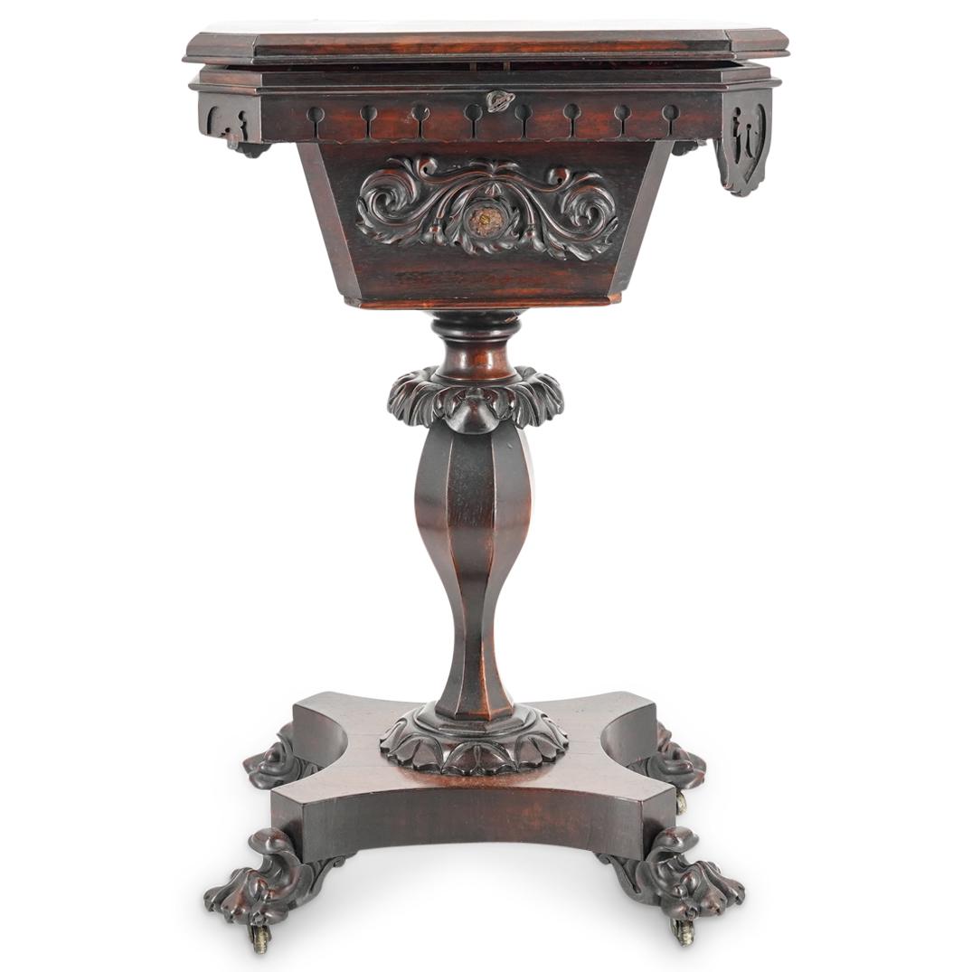 Antique Loache & Clarke English Wood Teapoy: DESCRIPTION: Antique Loache and Clarke patinated carved wood teapoy featuring four paw form feet attached to castors, foliage in high relief at the neck and beveled edges on the capital. Interior is c