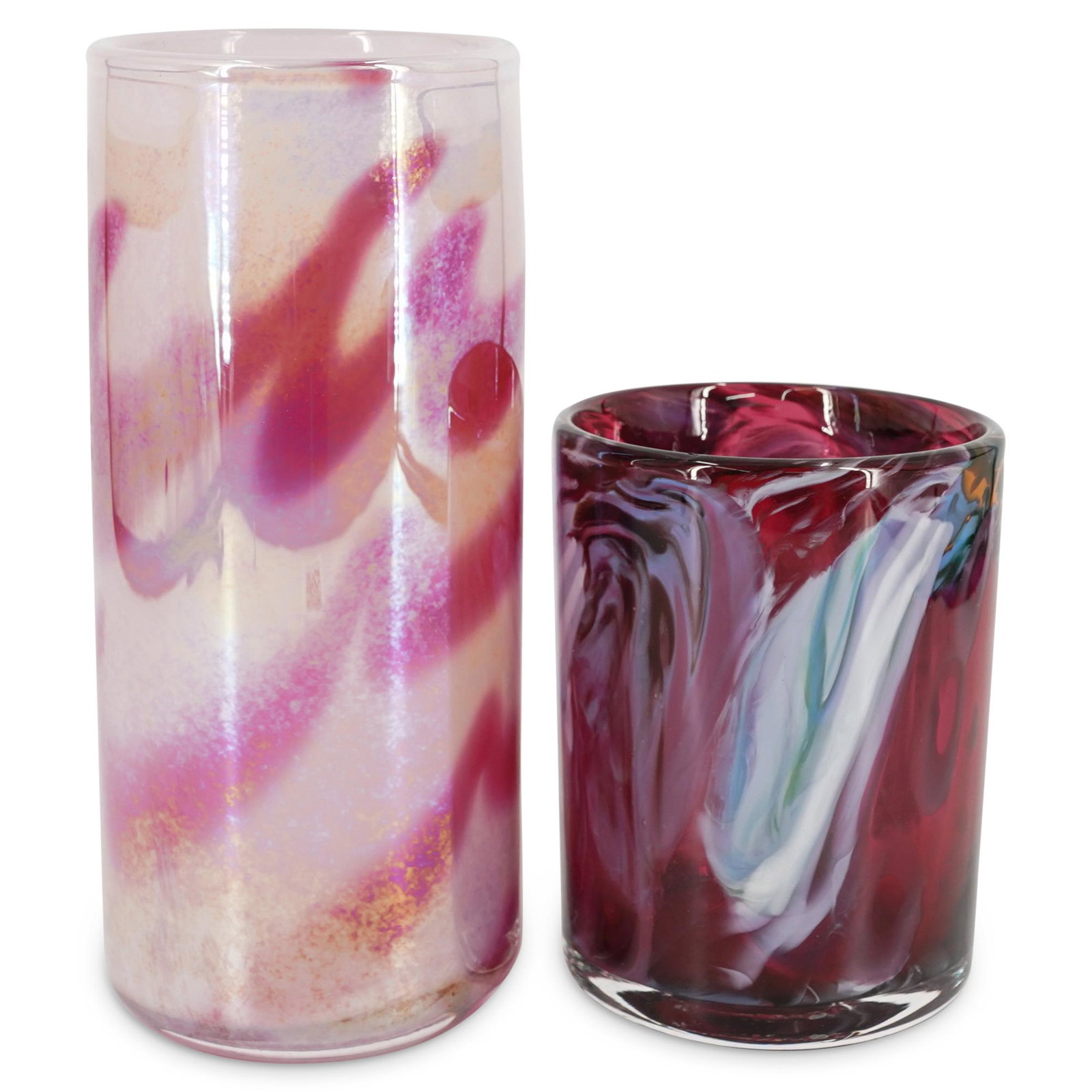 Pair Of Art Glass Vases: DESCRIPTION: Two signed art glass vases: one signed "Steve Palmer 1989" with purple swirls and one signed "S Bloom" with pink waves. CIRCA: 20th Century ORIGIN: USA DIMENSIONS: (Palmer) H: 7" D: 5" (B