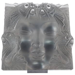 Rene Lalique "The Mask De Femme" Frosted Glass Plaque: DESCRIPTION: Rene Lalique "The Mask" frosted glass plaque. Sticker label at verso, signed: "R. Lalique, France" Includes chrome display stand. CIRCA: 20th Cent. ORIGIN: France DIMENSIONS: H: 12.5" x W