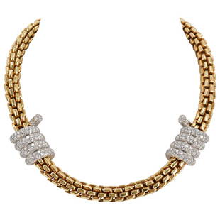 Bvlgari Style 18k Gold, Platinum and Diamond Chain Necklace: DESCRIPTION: An Italian 18k yellow gold necklace featuring in a "Franco" Link chain necklace, accented with two Platinum coil designs inserted with approximately 2.6cts in Diamonds. Completed with a