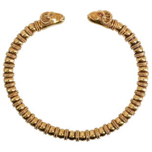 Lalaounis Style 18k Gold Ram Head Choker Necklace: DESCRIPTION: A Lalaounis style 18k yellow gold choker necklace, In a semi-flexible bypass design containing round beads, textured rondelle beads and ram head terminals. (Tested 18k) Total Weight: 124