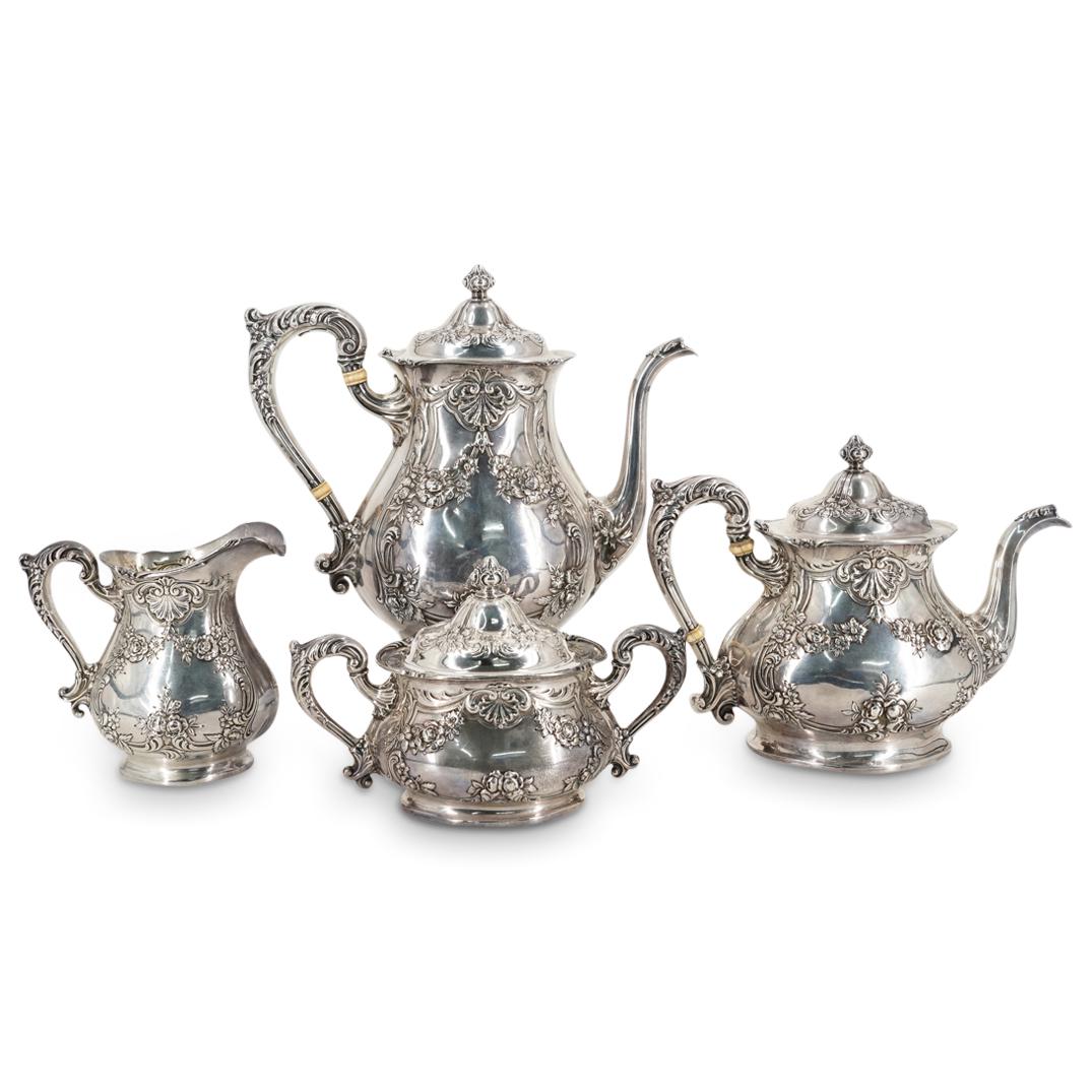 (4 Pc) Antique Gorham Sterling Silver Tea Set: DESCRIPTION: Gorham tea set each piece of which is decorated with floral and foliage motifs throughout and is marked on underside with Gorham hallmarks and "duRoi 1908". Teapot and coffee pot are embe