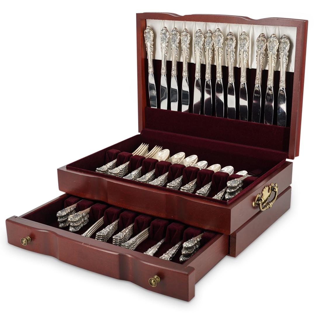 (98 Pc) Wallace "Sir Christopher" Sterling Silver Flatware Set: DESCRIPTION: (98 Pc) A Wallace Silversmiths "Sir Christopher" sterling silver flatware set with wooden case. This set includes: (12 Pc) Wallace "Sir Christopher" sterling silver dinner forks. L: 7 1/4