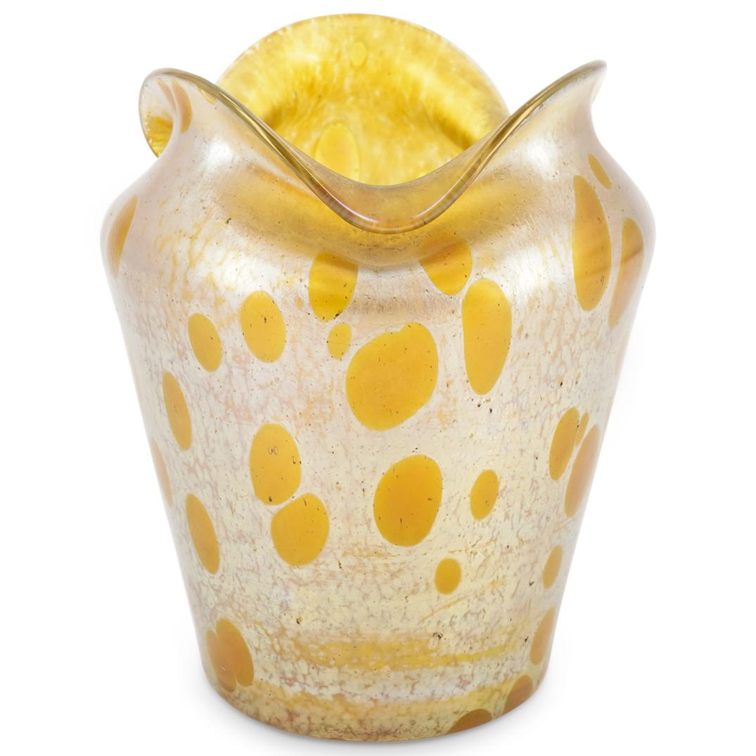 Antique Loetz Spotted iridescent Glass Vase: DESCRIPTION: Antique Loetz gold glass vase spotted around the body and with a handkerchief form rim. CIRCA: 20th Century ORIGIN: Austria DIMENSIONS: H: 6.75" X D: 5.75" CONDITION: Great condition. See