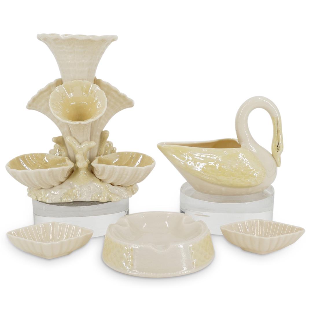 (5Pc) Antique Belleek Porcelain Dishes: DESCRIPTION: (5Pc) Antique Belleek porcelain dishes. Traditional hallmarks at the undersides. (1) Epergne comprised of shell form tri-cups at the base, tri-holders at the neck and one larger at the ce