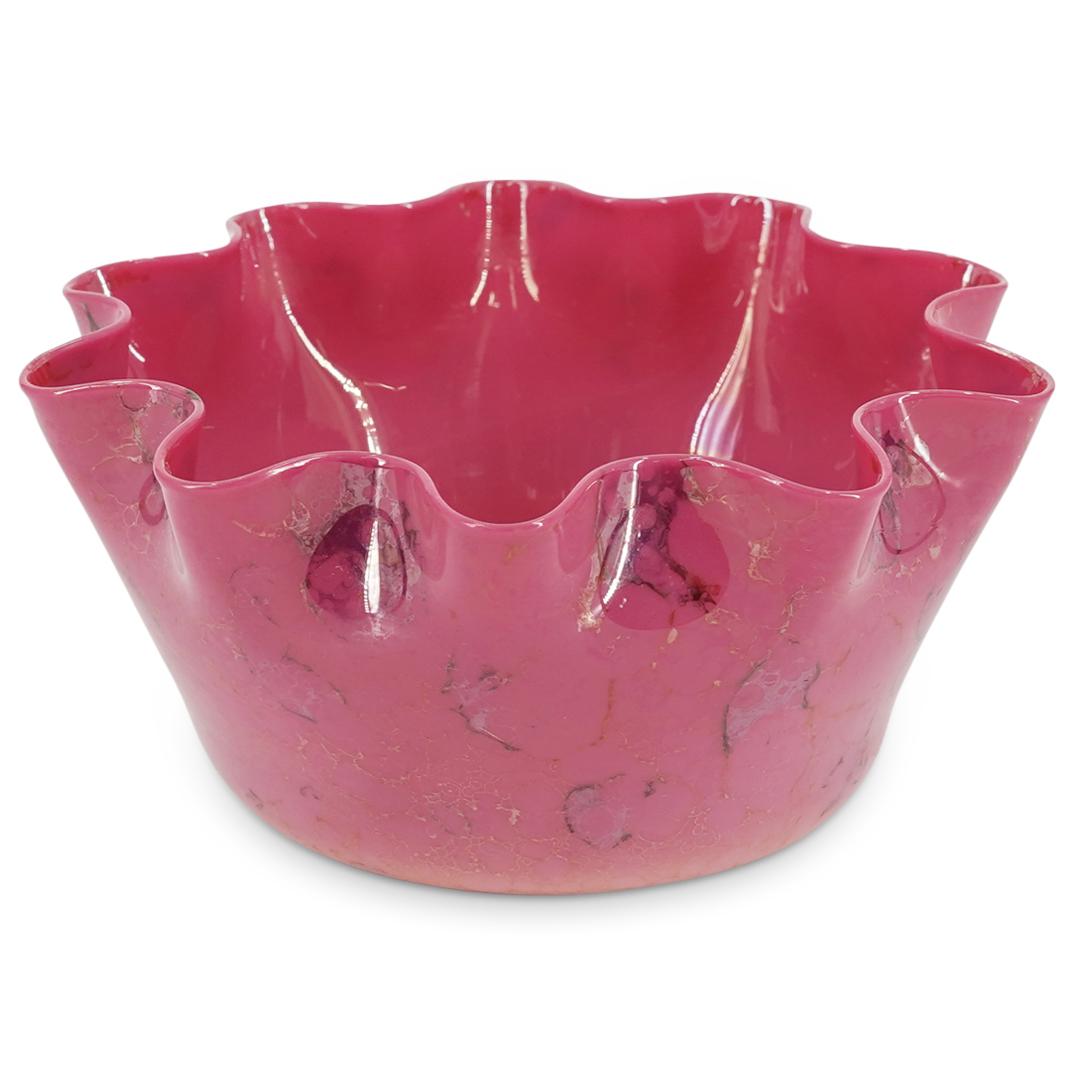 New England Agata Peach Glass Finger Bowl: DESCRIPTION: New England Agata glass finger bowl featuring a peach tones and a handkerchief design on the lip. CIRCA: Early 20th Century ORIGIN: USA DIMENSIONS: H: 2.5" W: 5" L: 5.25" Have a similar i