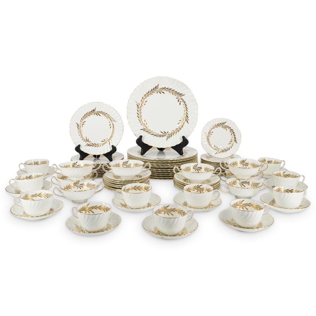 (81Pc) Minton "Golden Symphony" Porcelain Service Set: DESCRIPTION: (81Pc) Minton "Golden Symphony" porcelain service set featuring gilt rims and foliage rings around the centers. Hallmarked at the undersides "Golden Symphony Minton Bone China Made in Eng