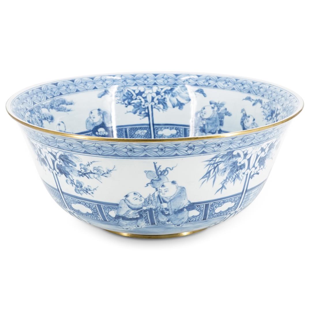 Large Maitland Smith Blue And White Chinese Bowl: DESCRIPTION: Maitland-Smith blue and white bowl decorated with multiple scenes of Chinese boys walking and playing in a grove and along a wall. Sticker on underside: DESIGED [sic] AND HAND MADE IN THI