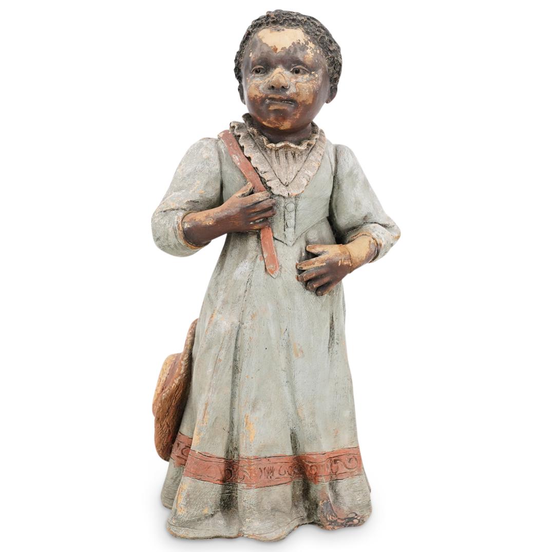 Goldscheider Terracotta Black Americana Figure: DESCRIPTION: Goldscheider terracotta black americana figure with polychrome painted finishes. Stamped at underside. CIRCA: 20th Cent. ORIGIN: Germany DIMENSIONS: H: 9.25" x D: 5" CONDITION: Great cond