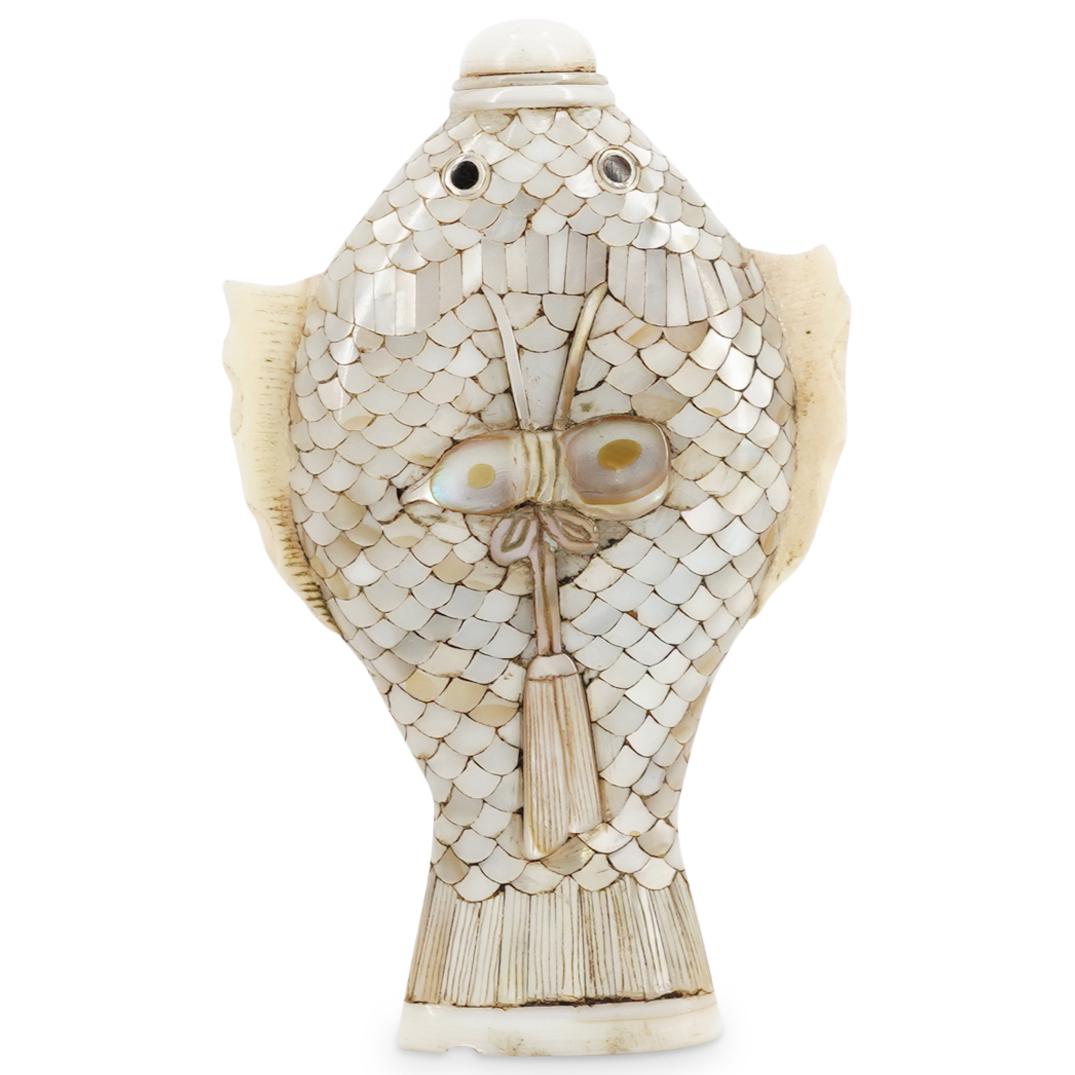 Antique Mother of Pearl Fish Form Snuff Bottle: DESCRIPTION: Antique double sided fish form snuff bottle composed of mother of pearl scales and bow with tassle depiction in relief at the faces, carved bone fins at the sides as well as inlaid black