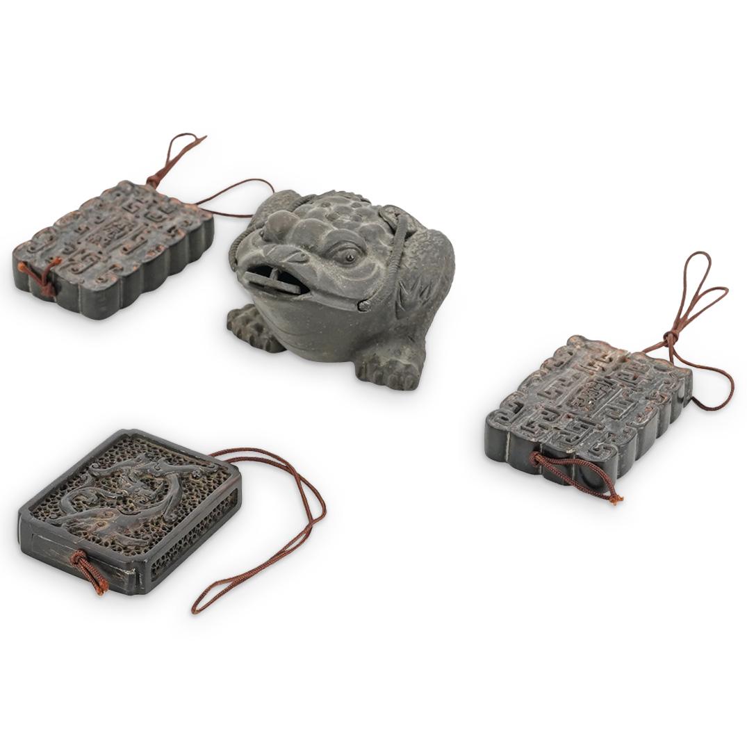 (9 Pc) Chinese Miniature Sculptures And Amulets: DESCRIPTION: Eight miniature carved figurines and amulets: one horn figurine of a man, one amber figurine of Budai, one green hard stone figurine of a monkey, one hard stone sculpture of a nutshell, t