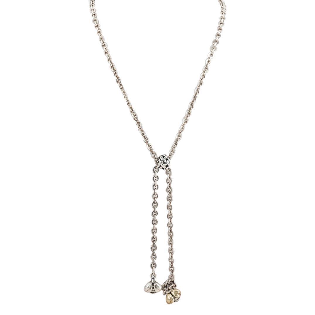 Saint By Sarah Jane 18k and Sterling Lariat Bee Necklace: DESCRIPTION: Saint By Sarah Jane 18k and Sterling Lariat Bee Necklace, comprised of an oval link chain fitted with honeycomb and bee motifs, accented with gilt overlay. Total Weight: 54 Grams CIRCA: 2