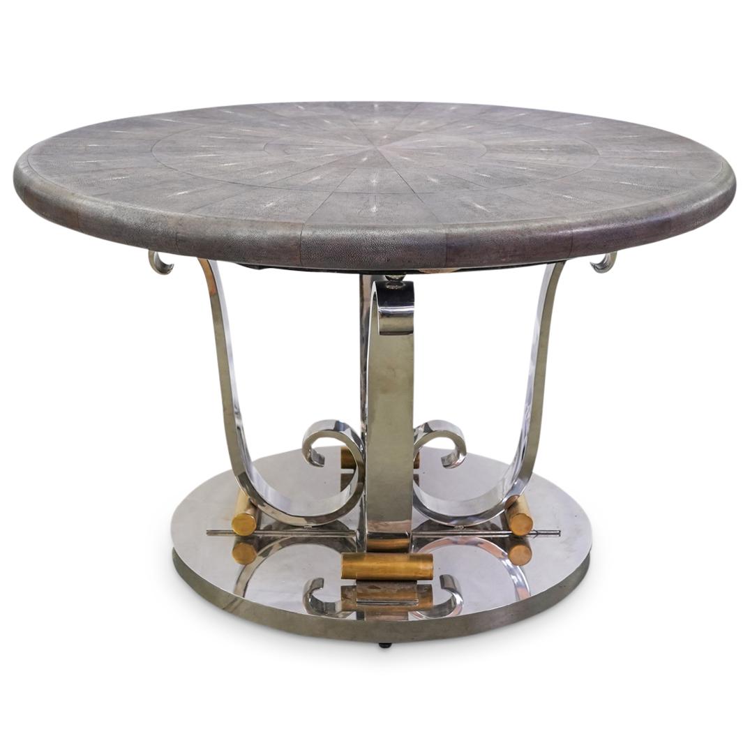 Ron Seff for Karl Springer Round Shagreen Table: DESCRIPTION: Ron Seff for Karl Springer round table featuring a table top wrapped by segmented dark gray toned stingray shagreen tapering towards the center and resting atop four chrome scroll form co
