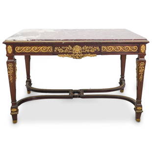 Maison Forest French Rouge Marble & Dore Bronze Table: DESCRIPTION: An antique Maison Forest French hall table, features a brown wood foundation, mounted with ornate figural and foliate dore bronze design. Completed with an inset rouge marble top