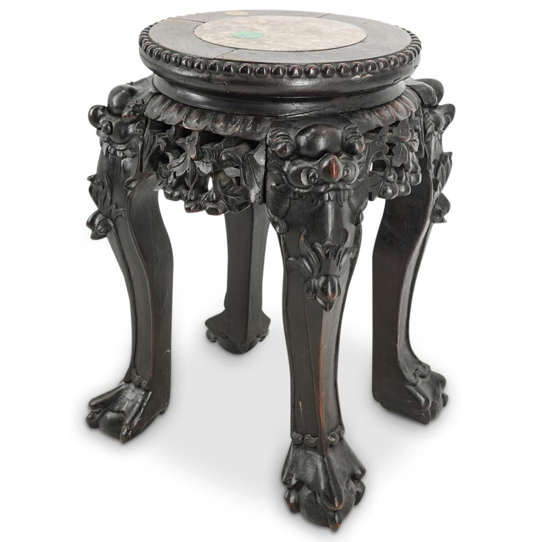 Chinese Carved Wood Marble Top Open Work Pedestal: DESCRIPTION: Carved wood pedestal built via joinery and featuring a marble inset top and open-work gourd and foliage designs on the skirt. Decorated with taotie beast designs at the top of the legs an