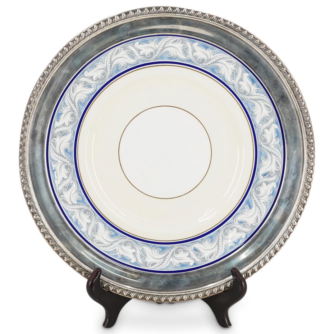 Royal Doulton "The Tewkesbury" Sterling Silver Porcelain Charger: DESCRIPTION: Vintage Royal Doulton porcelain charger plate in their discontinued design titled "The Tewkesbury" featuring a Sterling silver rim with wave designs in relief in a band around the edge, a